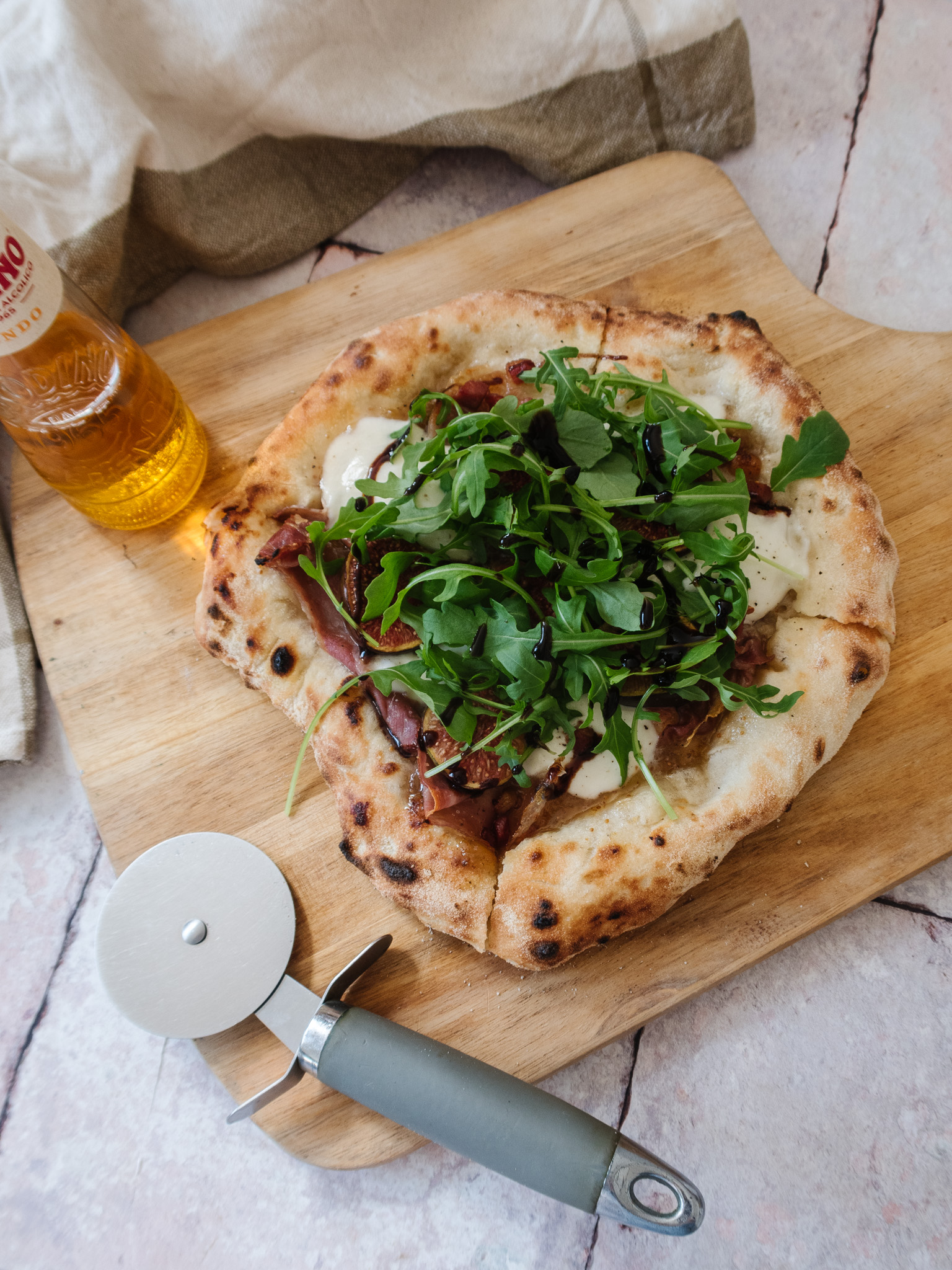 an edited lifestyle recipe Fig Jam, Prosciutto & Rocket Pizza